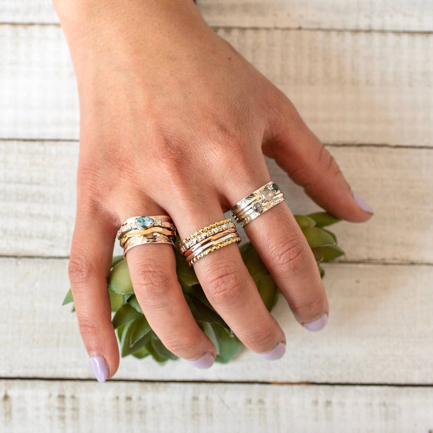 Sterling Silver Wave Spinner Ring w Blue Topaz: 7